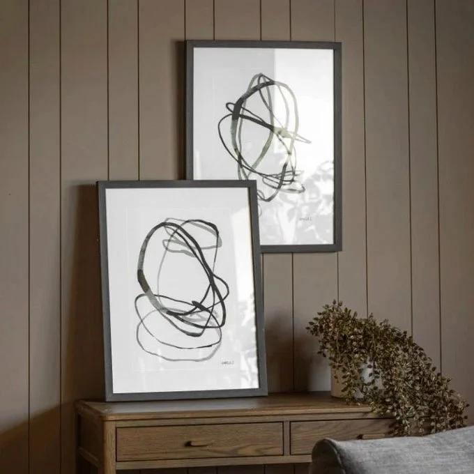 A striking pair of abstract prints