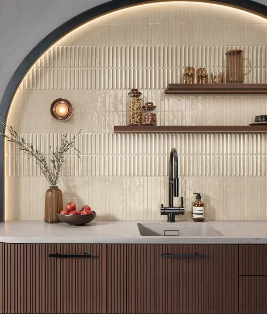 Ribbed cabinet fronts under ribbed tile, and it doesnt tip over into too much, somehow.